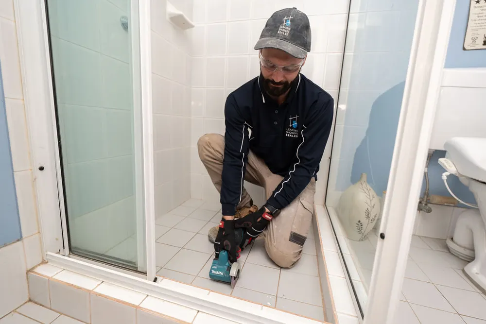 Regrouting shower floor tiles