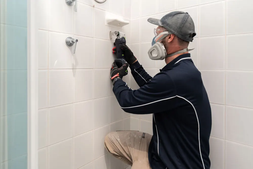 Removing damaged grout before regrouting