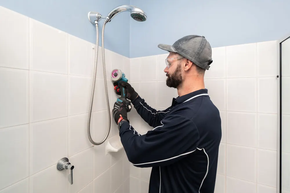 Replacing grout on a shower wall