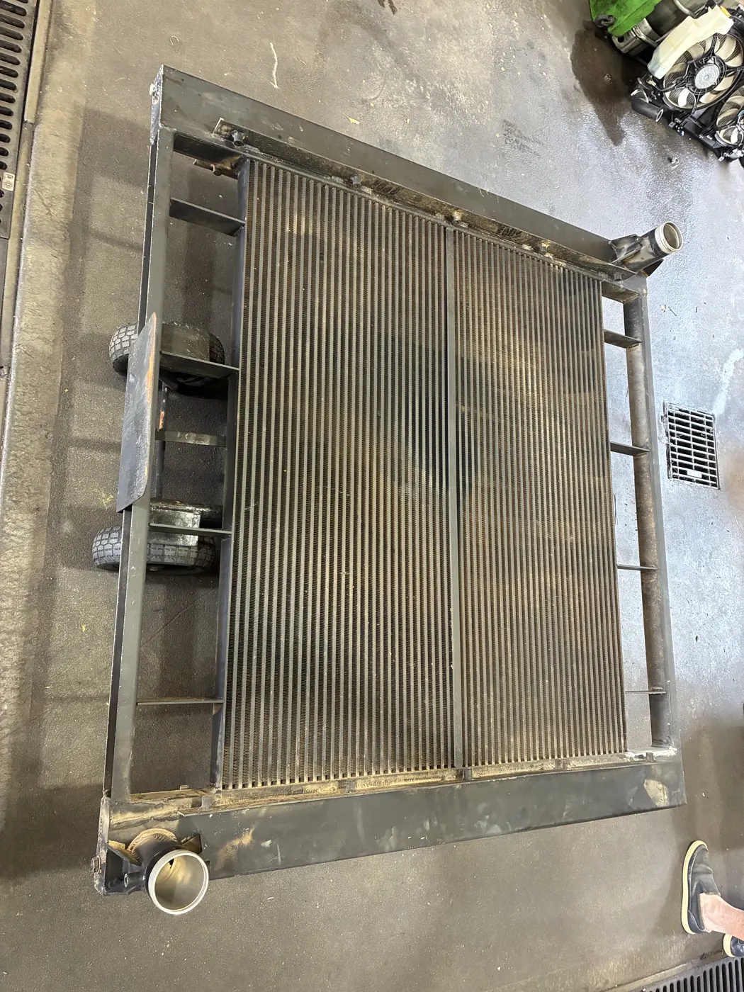 Large industrial radiator core on the floor of the Radiators Perth workshop, Malaga