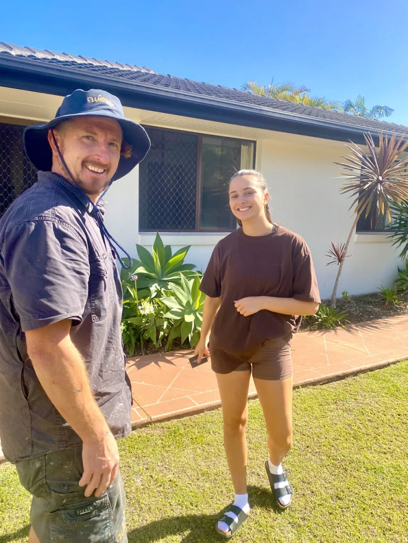 Bryce with a customer outside a Palm Beach home